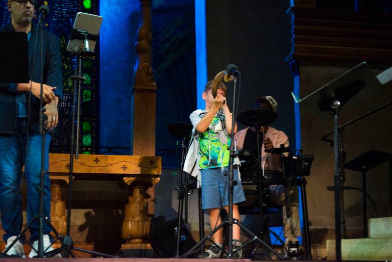 Boy blowing the shofar